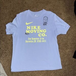 Nike Men's Light Blue Tee with Yellow Graphics